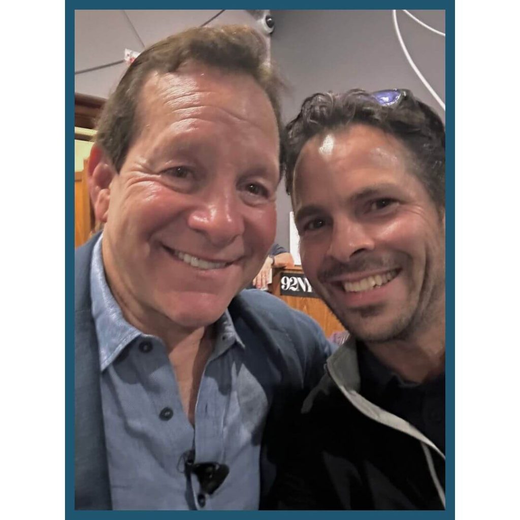 Steven Guttenberg and Nick Ortner smiling for the camera